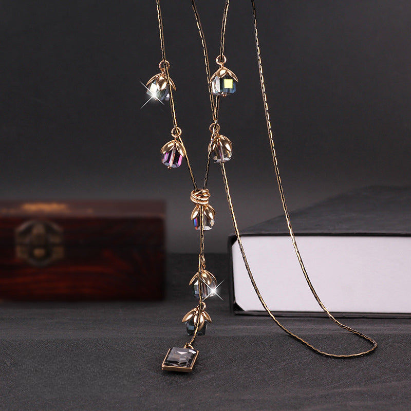 سلسلة على شكل ورقة شجر مع شراشيب كريستالية ، مصنوعة من ستيل التيتانيوم ، قلادة طويلة