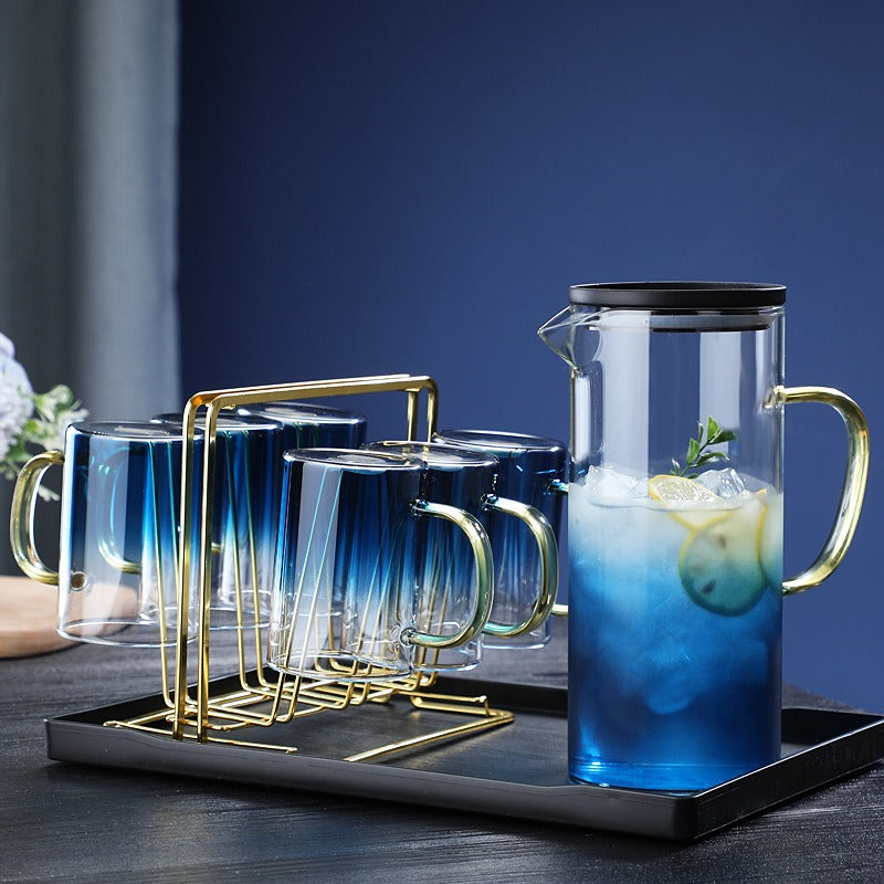 إبريق ماء زجاجي إبريق مع  4 أكواب للإستخدام المنزلي مع حامل اكواب و صينية تقديم ،إبريق شاي سخن وبارد، إبريق ماء زجاجي مع مقبض.
