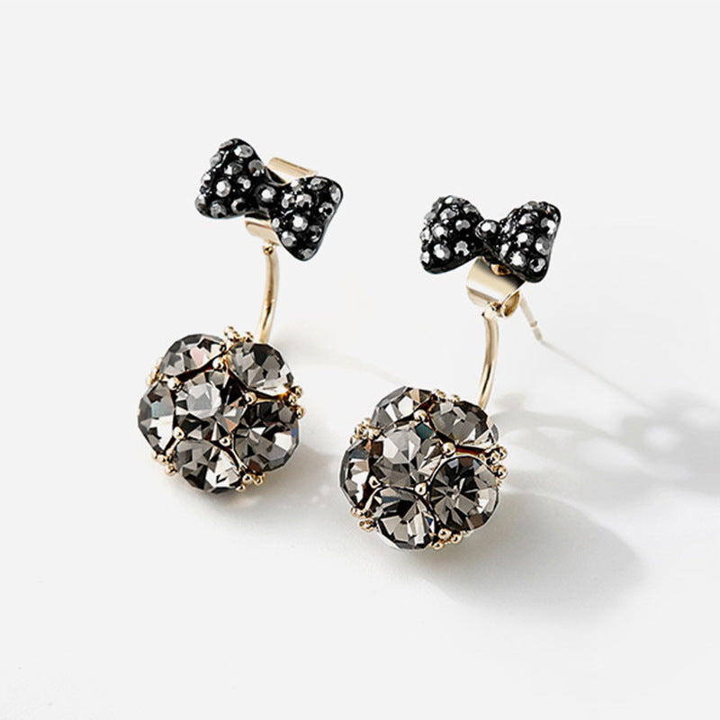 حلق بتصميم على شكل فيونكة مزدوجة من حجر الراين