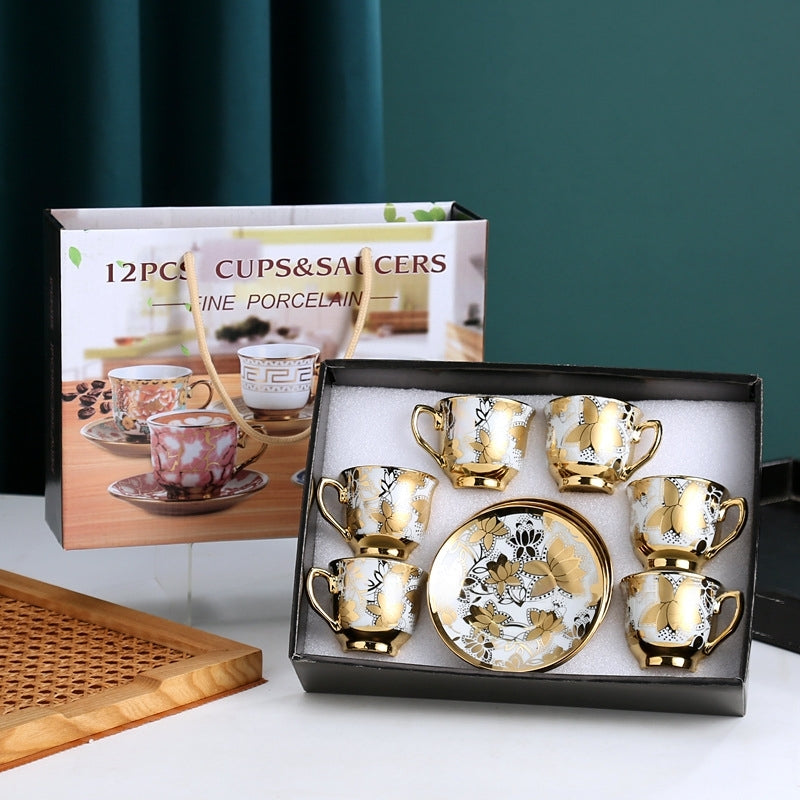 طقم قهوة من البورسلين الفاخر بتصميم زهرة اللوتس مطلى بالذهب، يتكون من 12 قطعة مع صندوق هدايا أسود