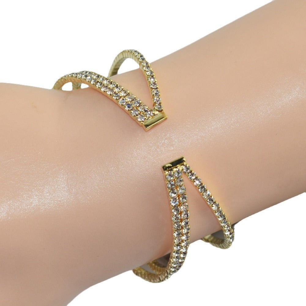 سوار عريض مزدوج مرن مرصع بالكريستال الشفاف