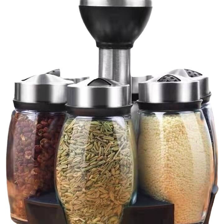 رف منظم للتوابل دوار 360 درجة يوضع على المنضدة مع مجموعة من 7 عبوات زجاجية للاعشاب و الملح و الفلفل والبهار مزود بحامل دوار بزاوية 360 درجة