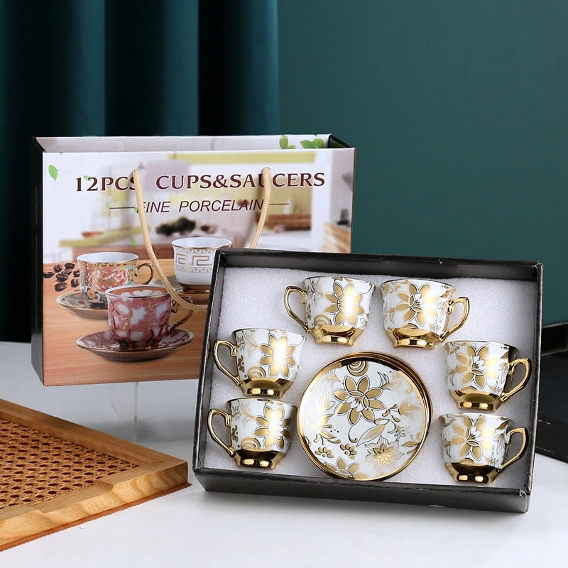 طقم قهوة من البورسلين الفاخر بتصميم زهرة اللوتس مطلى بالذهب، يتكون من 12 قطعة مع صندوق هدايا أسود