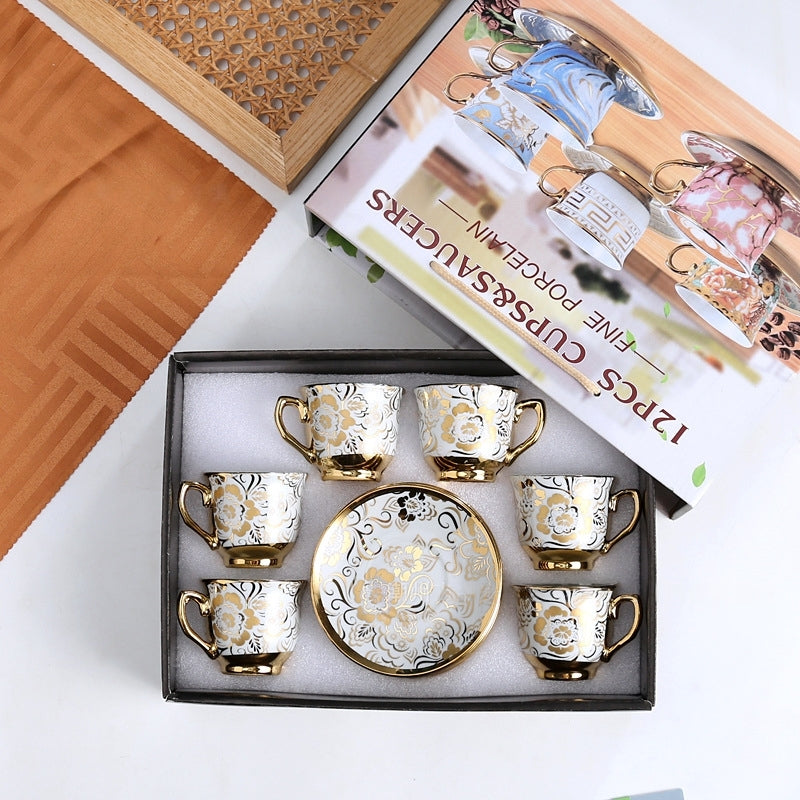 طقم قهوة من البورسلين الفاخر بتصميم زهرة اللوتس مطلى بالذهب، يتكون من 12 قطعة مع صندوق هدايا أسود