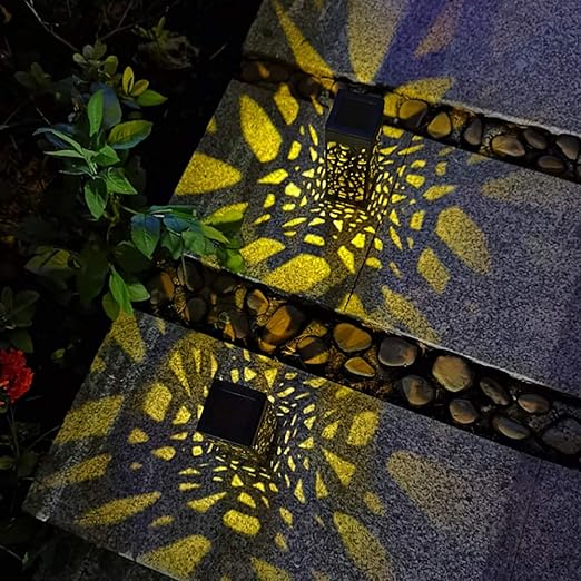 مصباح يعمل بالطاقة الشمسية بتصميم مجوف منحوت وإضاءة هادئة ,