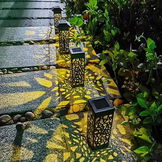 مصباح يعمل بالطاقة الشمسية بتصميم مجوف منحوت وإضاءة هادئة ,