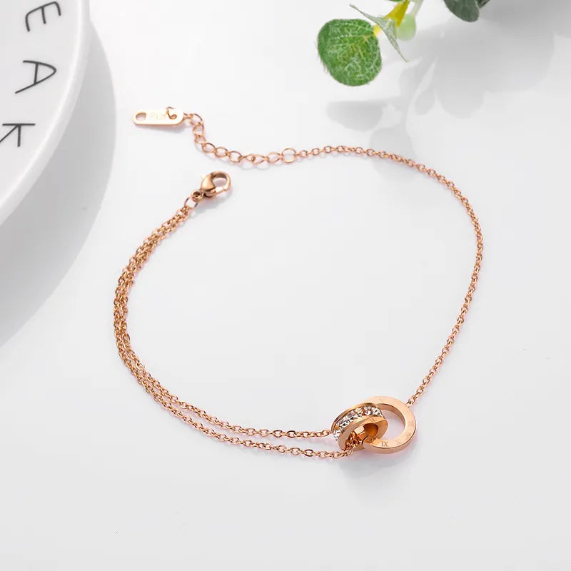 أنسيال من الستانلس ستيل البيور المطلي غير قابل للصدأ ، بلون ذهبي رقيق  وأرقام رومانية بتصميم خاتم مزدوج